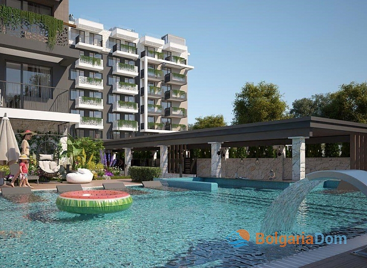 Apartment with a pool view in a new premium spa complex. Photo 1