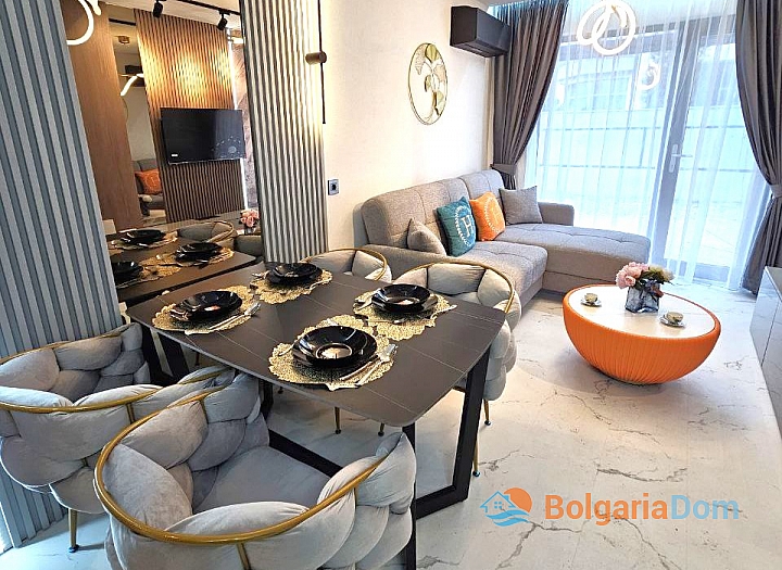 Schöne Wohnung in einem neuen Premium-Komplex. Foto 1
