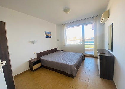 Pěkný byt na klidném místě v první linii . Foto 4