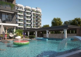 Apartment with a pool view in a new premium spa complex. Photo 1